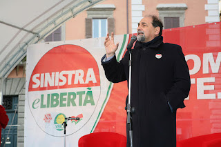 Umberto Guidoni addresses supporters of the Sinistra e Libertà party during a rally in Rome