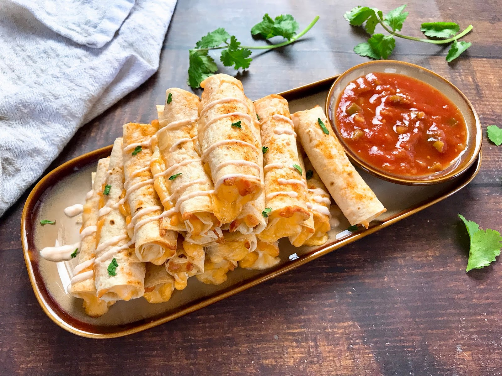 Baked Cheese Taquitos with Spicy Sour Cream