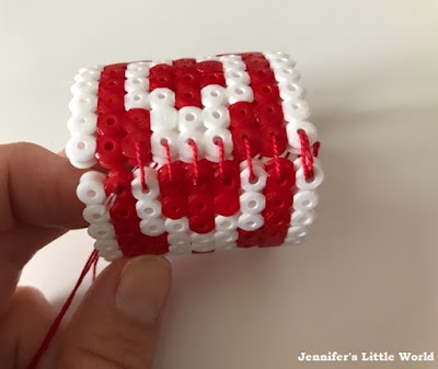 Scandi inspired red and white Hama bead battery candle holders