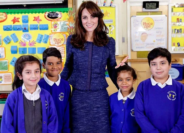 Catherine, Duchess of Cambridge poses for a photo with Nimra, 10, Ryan, 10, Bailey-Rae ,7, and Connor, 11, from Salusbury Primary School in Queen's Park, London, during filming of a video message for Children's Mental Health week.