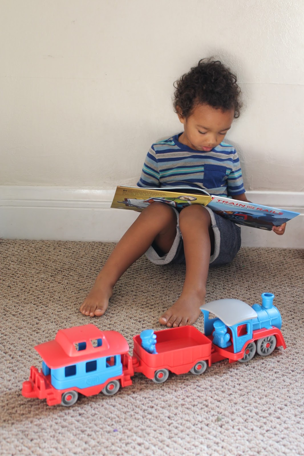 green toys train and storybook