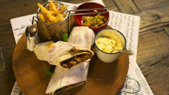 Beirut lamb pizza wrap in a plate