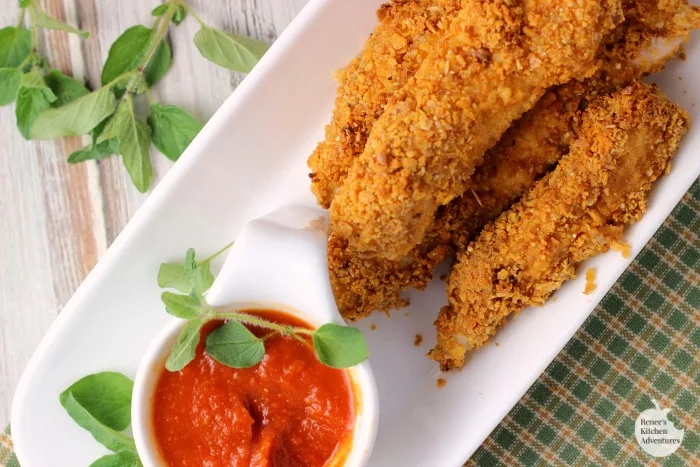 Crispy Gluten Free Cheesy Chicken Fingers | by Renee's Kitchen Adventures are delicious gluten free, crispy, oven baked, cheesy chicken fingers the entire family can enjoy for lunch, dinner or a wholesome snack! #ad