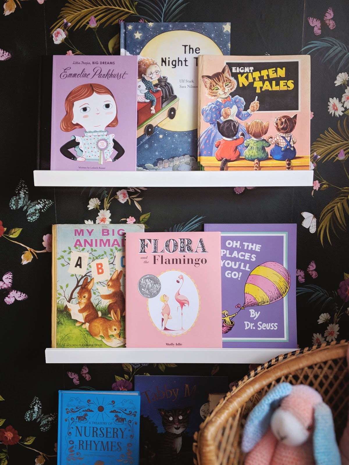 Girls toddler room Picture ledges book display