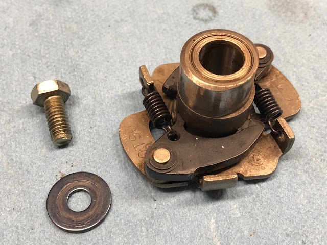 CT90 Spark Advanacer Picture of CT90 spark advancer and mounting bolt.