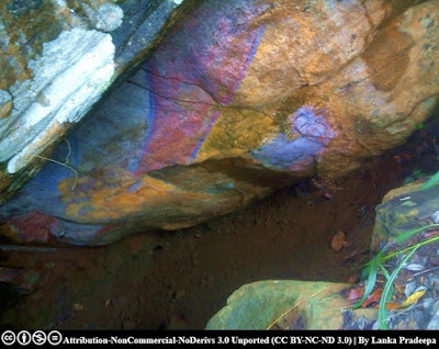 A painted rock cave at Gallengolla Viharaya, Kandy