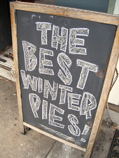 The Tuck Shop sign reads The Best Winter Pies