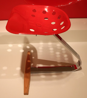 The Mezzadro chair incorporated a tractor seat mounted on a metal and wood base The Mezzadro chair incorporated a tractor seat mounted on a metal and wood base