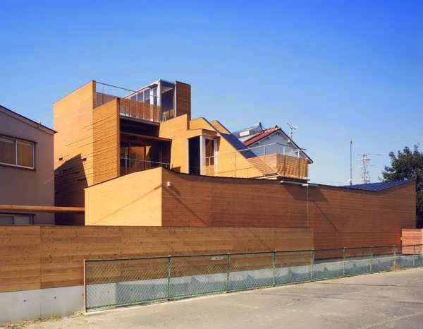 Japanese Wood-Clad House Design With Multi-Level Decks