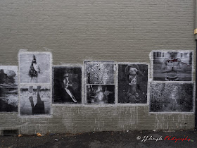 Pasted images on gray wall