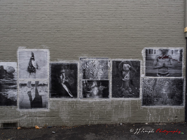 Pasted images on gray wall