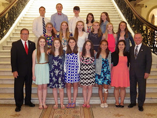 Senator Ross on left, Representative Roy on right with HMMS students