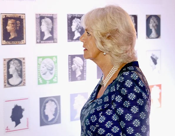 Duchess Camilla attend a reception to mark the 500th Anniversary of the Royal Mail Pearl necklace, pearl bracelet, diamond rings, jeweler