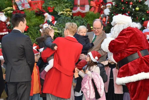 Prince Albert, Princess Charlene, Prince Jacques and Princess Gabriella attended the Children's Christmas ceremony and the Christmas gifts distribution at the Monaco Palace.