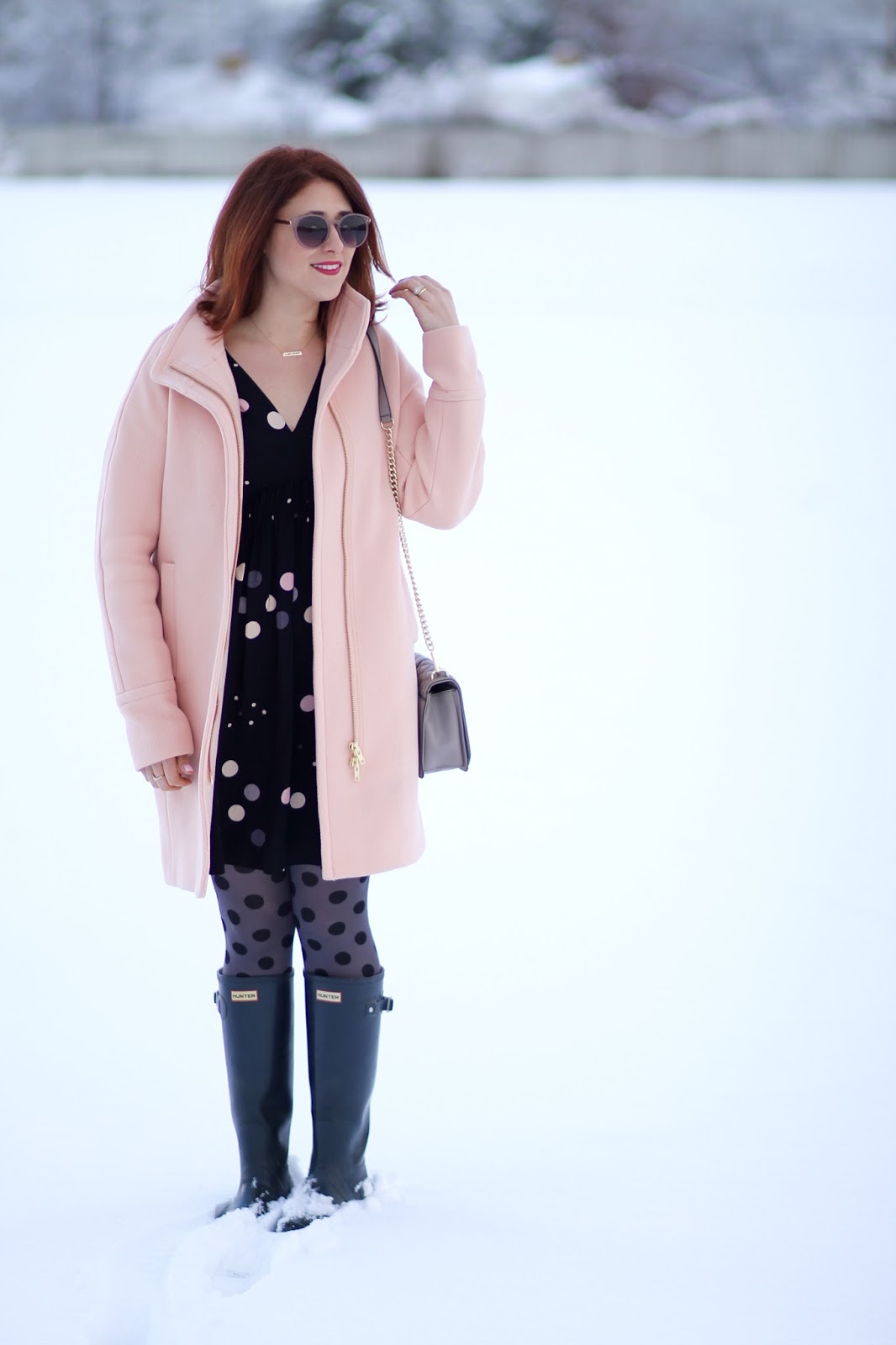 anthropologie felicity dress, polka dot tights, cocoon coat in pale ginger, red hair and navy hunter boots make a casual and cute affordable outfit for work or teacher