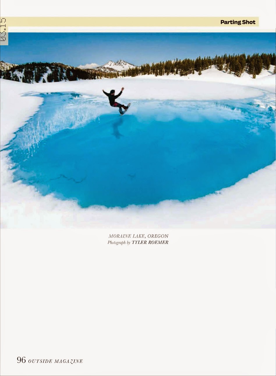 Justin Norman pond skims on his snowboard in the backcountry of Oregon. 