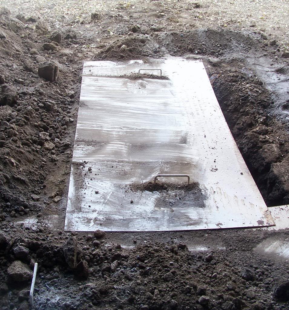 Cowgirl's Country Life Cooking a Whole Hog Underground