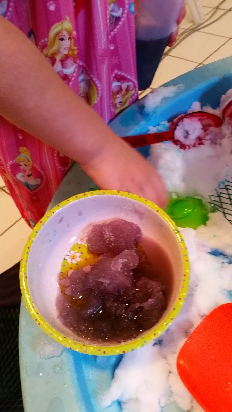 Indoor snow play - snow colored with purple water