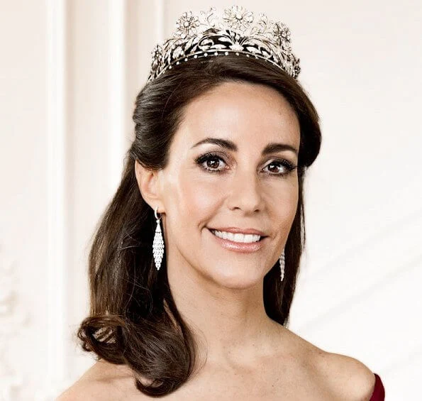 Princess Marie's dress was by Rikke Gudnitz. Princess Marie's diamond earrings were by the brand Christine Hvelplund