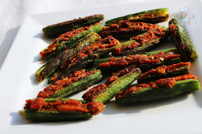 Indian veggie side dish / okra stuffed stuffed with indian spices and then shallow fried yummy veggie side dish for chapati rice tasty ...Ayeshas kitchen tastymalabarfoods.com