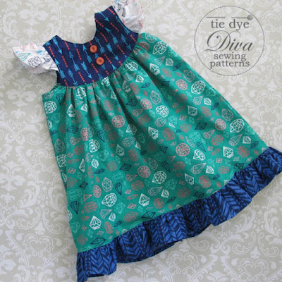 http://www.tiedyedivapatterns.com/product/the-butterfly-dress-flutter-sleeve-dress-with-ruffle-hem-size-2-to-8