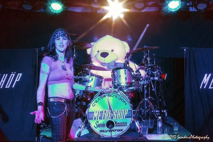 Giant Teddy bear Lady Cuddles rushes the stage and takes over the drums in Dallas