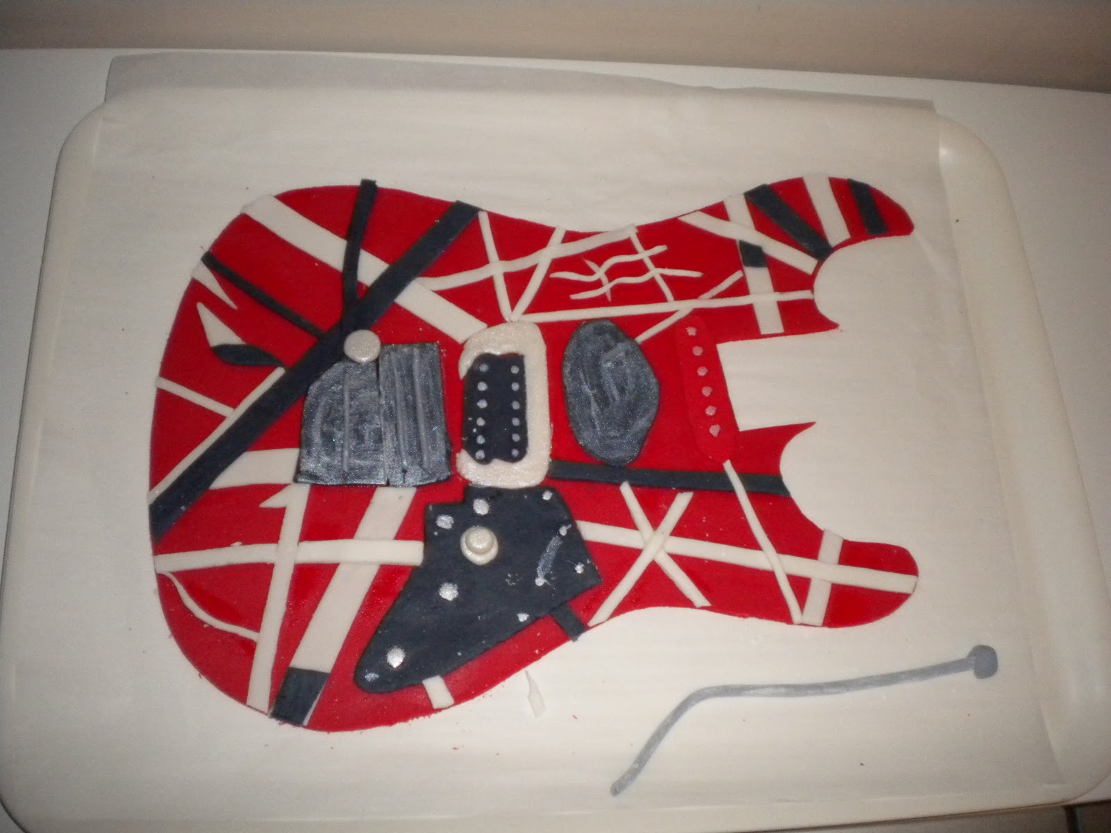 Decorazione murale con chitarra elettrica | IT