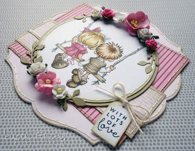 Shaped pink card with couple on swing (image from LOTV)