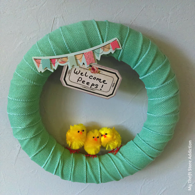 Welcome Peeps! Create this darling baby chick spring wreath with dollar store crafts, in just 15 minutes! 15 minute baby chick dollar store spring wreath