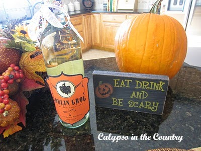 Halloween wine and sign