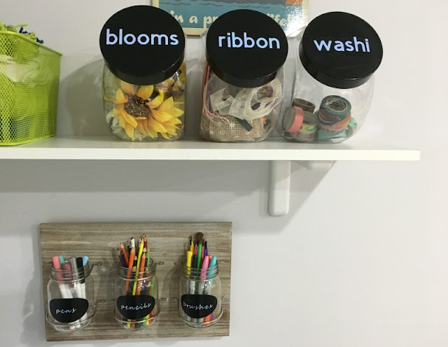 Keep all your craft supplies labeled with pretty holographic vinyl using your Cricut!