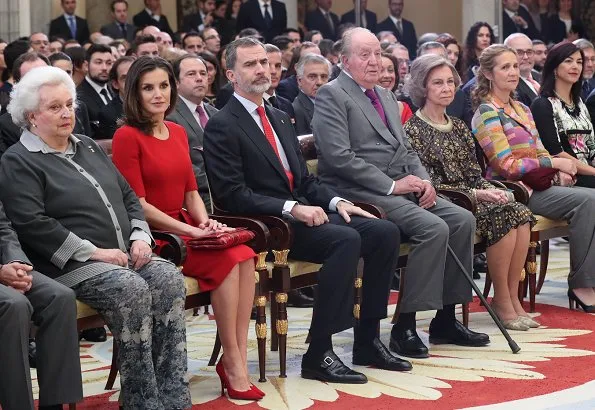 Queen Letizia wore Carolina Herrera red peplum stretch wool dress and Carolina Herrera clutch. Queen Sofia and Infanta Elena