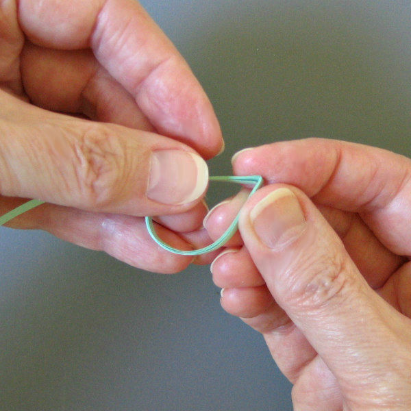 Shaping a quilled teardrop ring coil