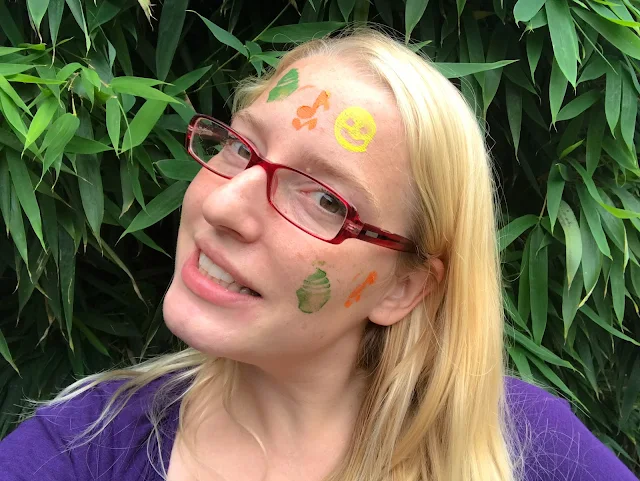 Me looking beautiful with Snazaroo Birthday Party face paint stamps on my face (a cake, music notes and a smiley face)