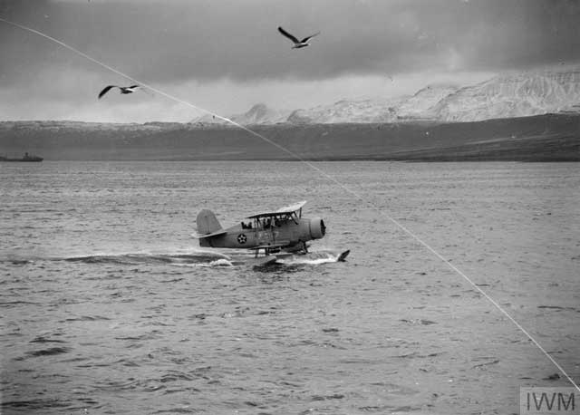 USS Curtiss Biplane, 23 January 1942 worldwartwo.filminspector.com