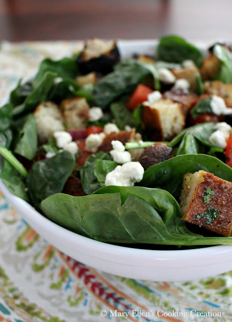 Cripsy, charred grilled bread for grilled bread salad with spinach, tomatoes and blue cheese. The perfect summer salad. Great for entertaining. #salad #grilledbread #panzanella