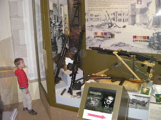 cabinet of firearms in museum