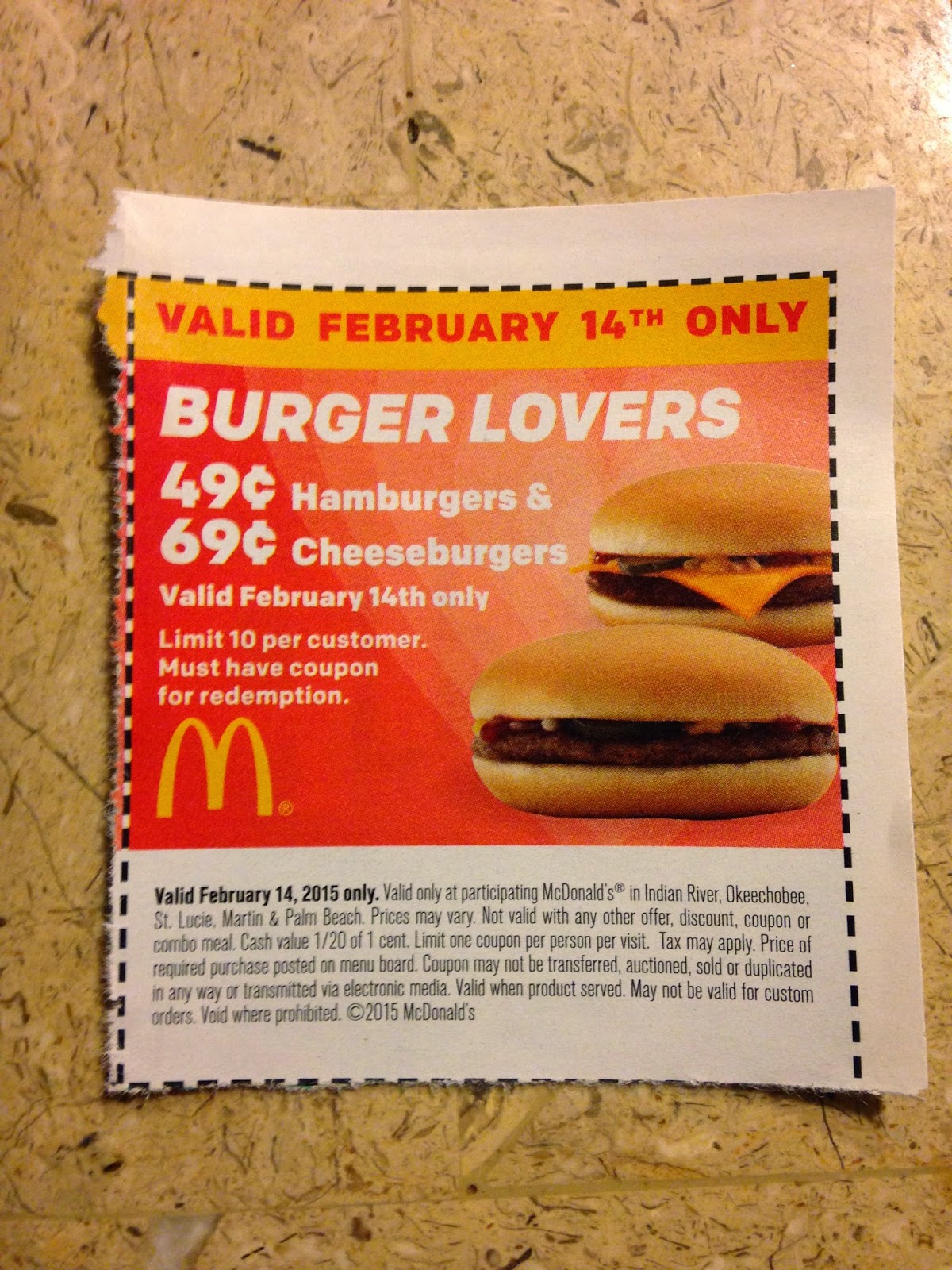 "Valid February 14th only" "BURGER LOVERS" "49¢ Hamburgers & 69¢ Cheeseburgers" "Valid February 14th only" "Limit 10 per customer." "Must have coupon for redemption."