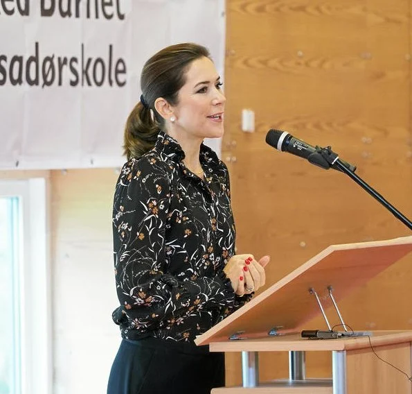 Crown Princess Mary wore a Isabel Marant blouse and Gianvito Rossi shoes. Red Barnet and Minister Ulla Tørnæs in Roskilde