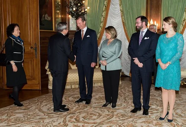 Prince Guillaume and Princess Stéphanie at New Year's reception. Princess Stéphanie wore Prada Lace Dress and Prada leather pumps, shoes, diamond earrings