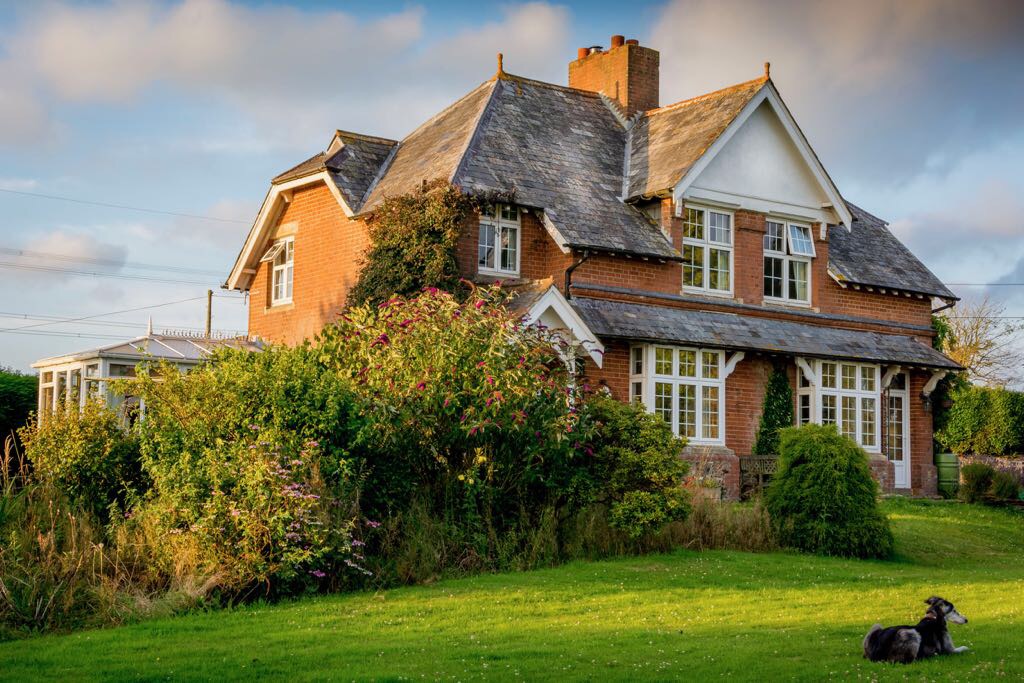 English countryside Victorian red brick house, Devon, England, UK