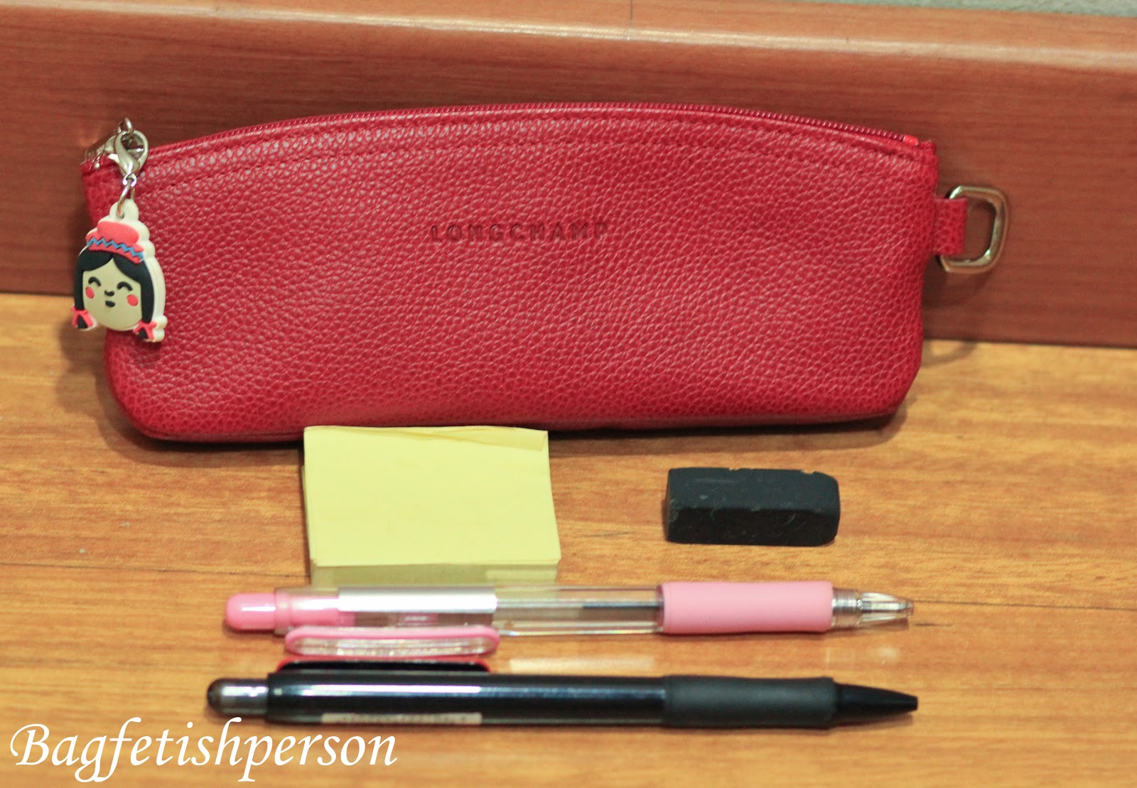 Longchamp red pencil case. A matching case with my card wallet.