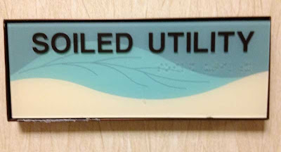 Sign that reads Soiled Utility