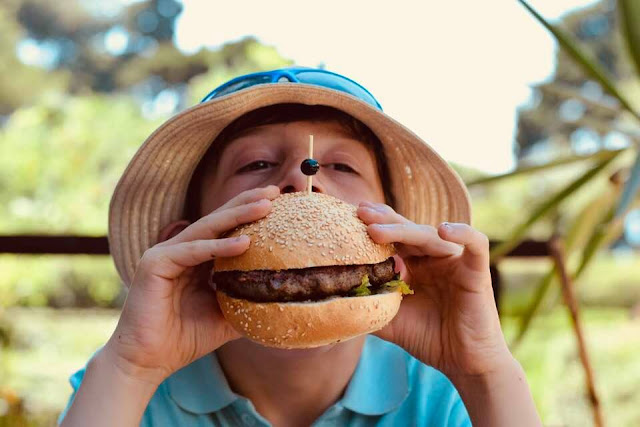 Child eating burger