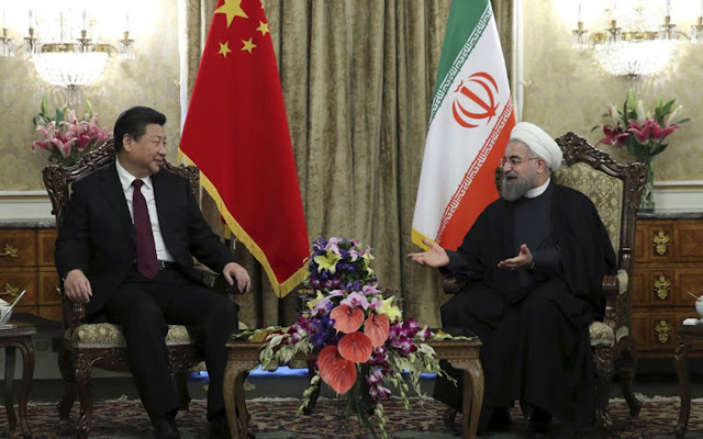Iranian President Hassan Rouhani meets with Chinese President Xi Jinping in Tehran, Iran January 23, 2016. Photo: Reuters