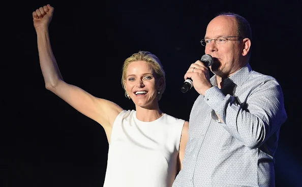 Princess Charlene of Monaco and Prince Albert II of Monaco attend the show of British singer Robbie Williams during celebrations marking Prince Albert II's decade on the throne