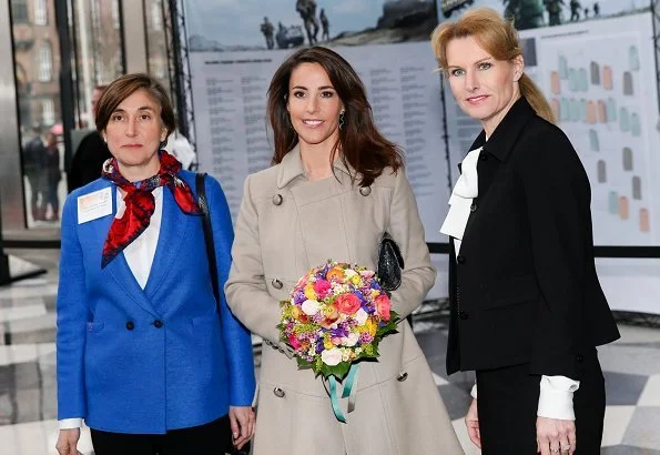 Princess Marie wore a new wool-blend knee-length coat by Paul & Joe. Tine Roed and Denmark Ambassador of France Caroline Ferrari