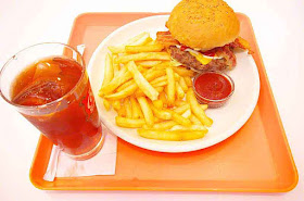 iced tea, fries, bacon and cheese burger