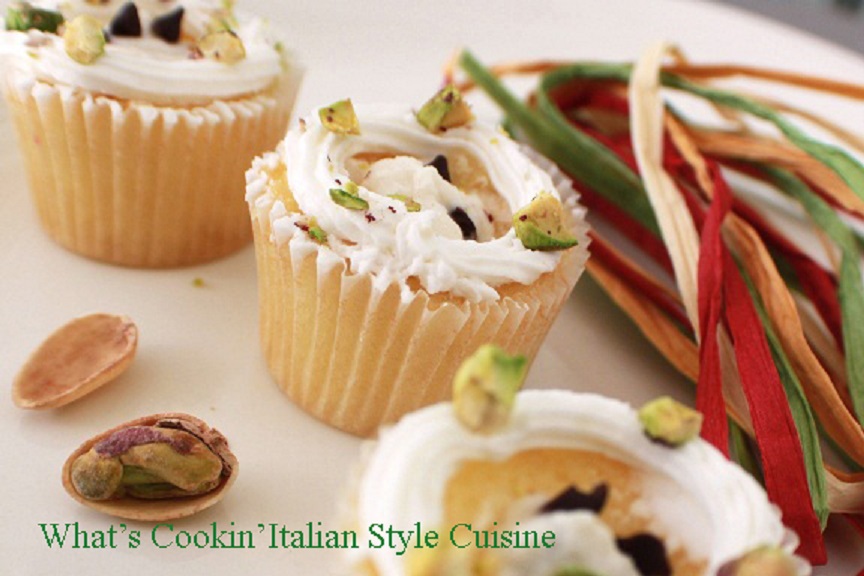 Italian Cannoli Filled Cupcakes a decadent filling with ricotta cheese, chocolate and pistachio