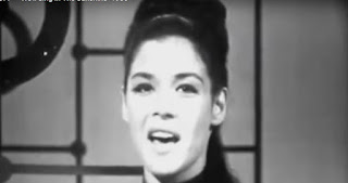 File Photo of Gale Garnett singing her 1964 folk hit "We'll Sing in the Sunshine"